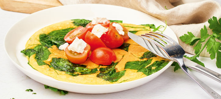 Omelett mit Tomaten, Spinat und Ziegenkäse